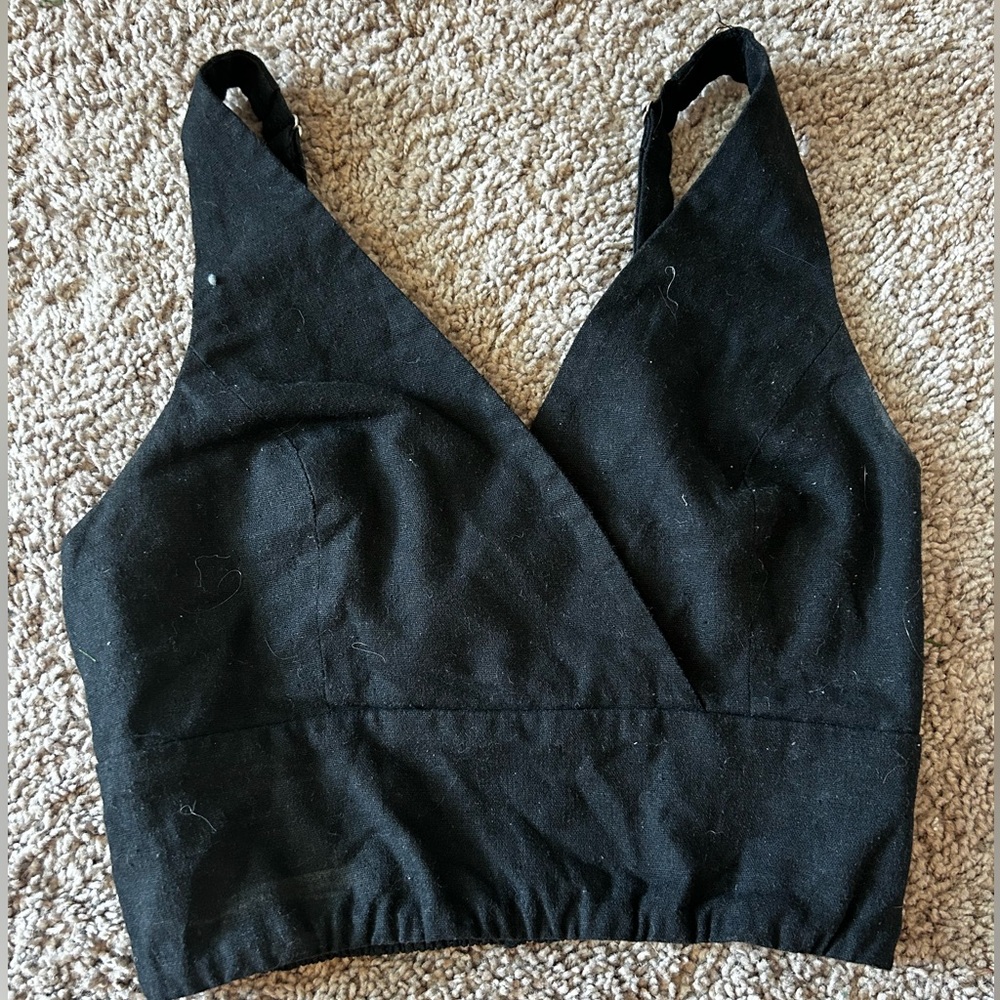 Black going out top